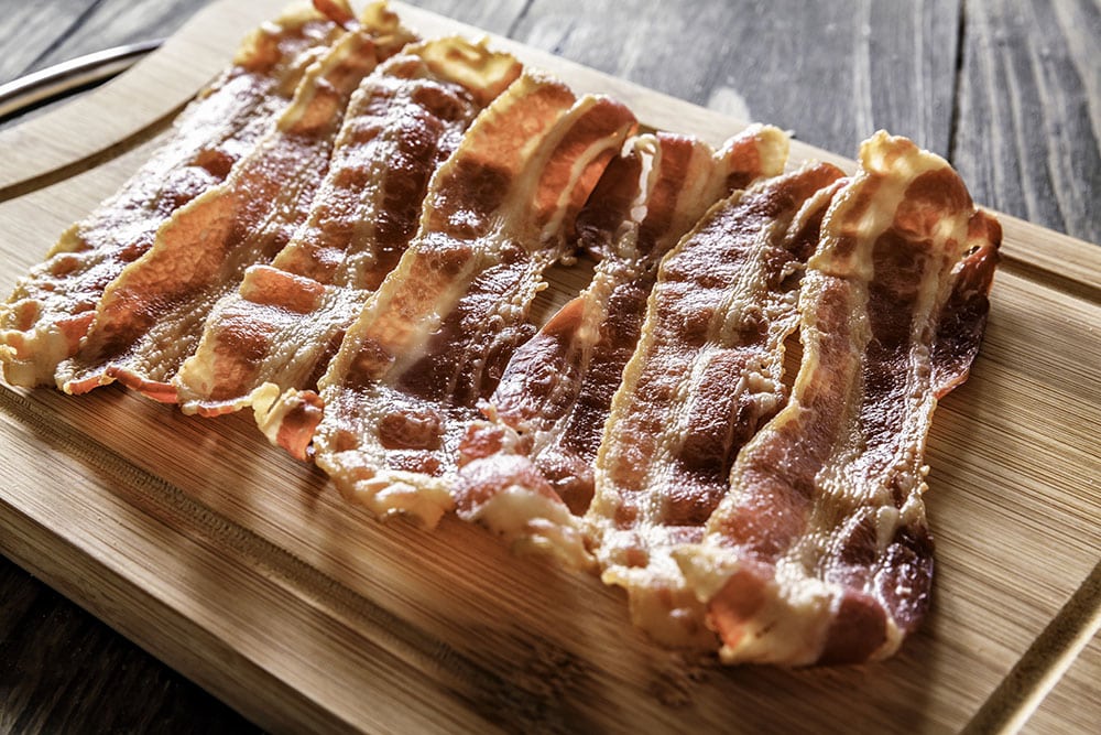 Roasted Bacon On Cutting Board Roasted Bacon On Cutting Board.